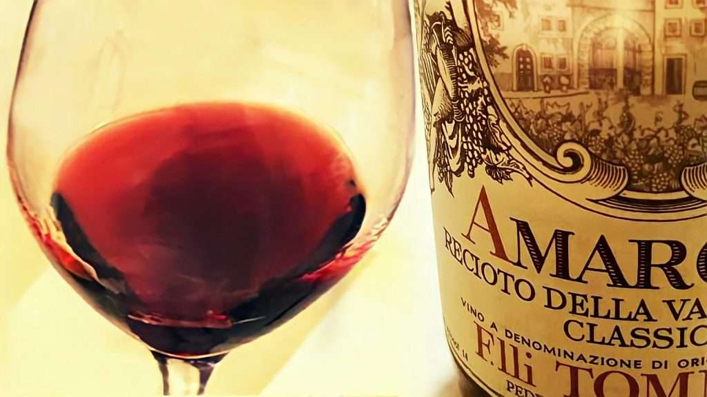 Un Amarone della Valpolicella a cinquant’anni dalla vendemmia, emozione nel bicchiere amarone tommasi 1969 bicchiere e bottigia